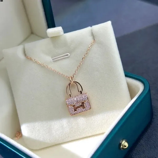 گردنبند نقره زنانه برند هرمس ( HERMES ) مدل کیف دستی | ساخت کشور چین (OEM BY CHINA)